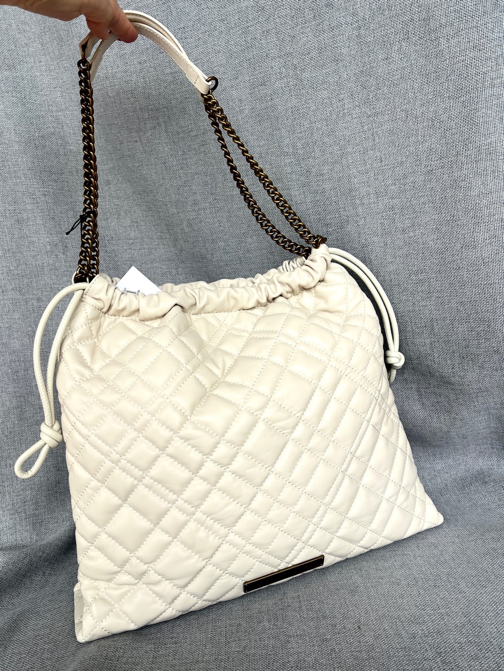 Kurt Geiger Brixton Drawstring Large Quilted Leather Chain shoulder bag BONE